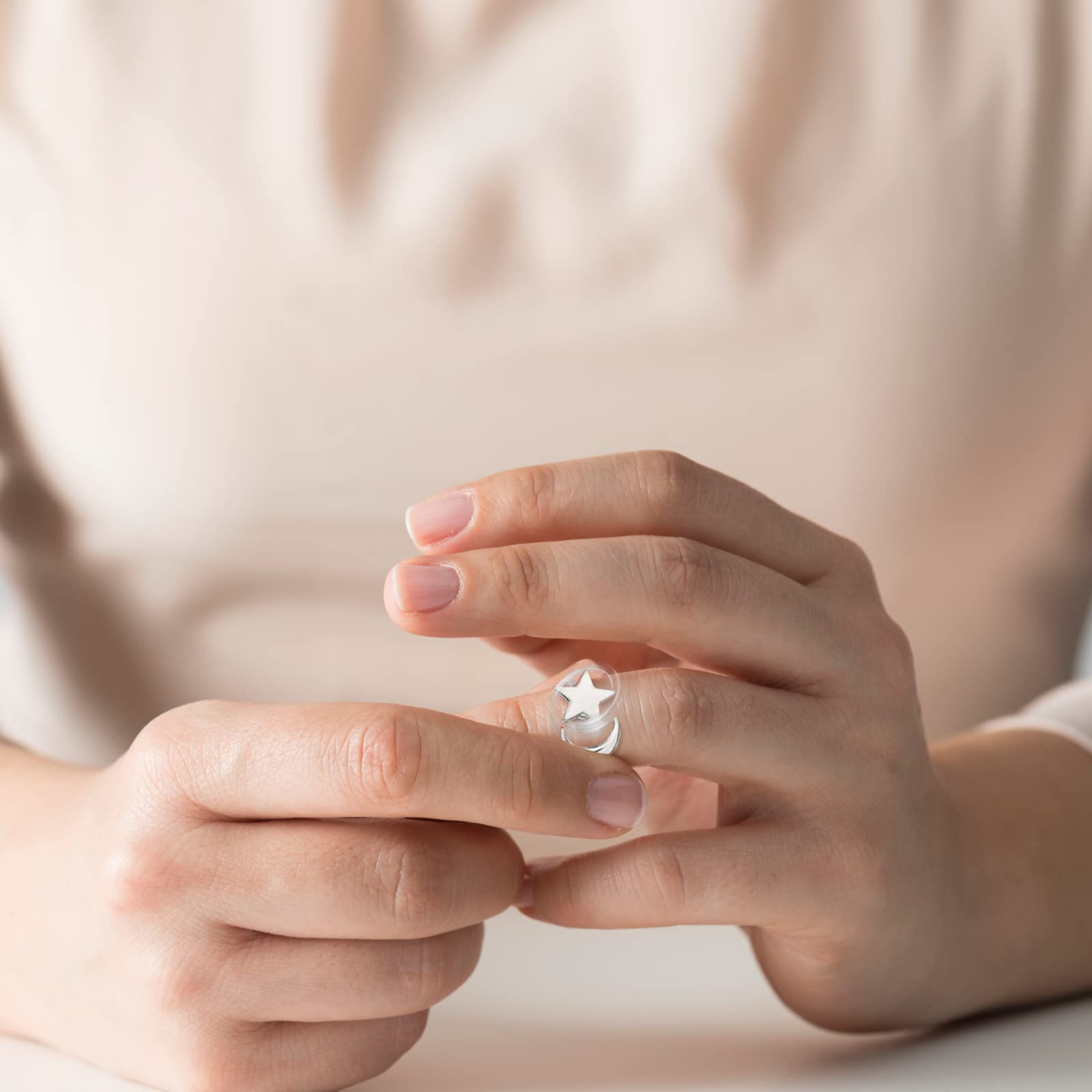 ATCEME adjustable opening rings on finger, fits most sizes.