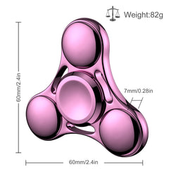 ATESSON pink fidget spinner in-hand demonstrates portable stress relief on the go.