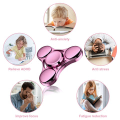 ATESSON pink fidget spinner on-desk spin captures focus during work.