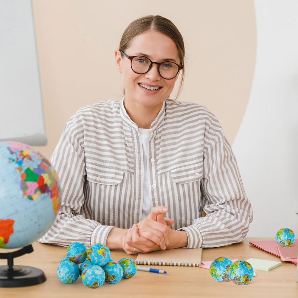 Atiloy globe stress ball on desk, a compact sensory distraction for work or study