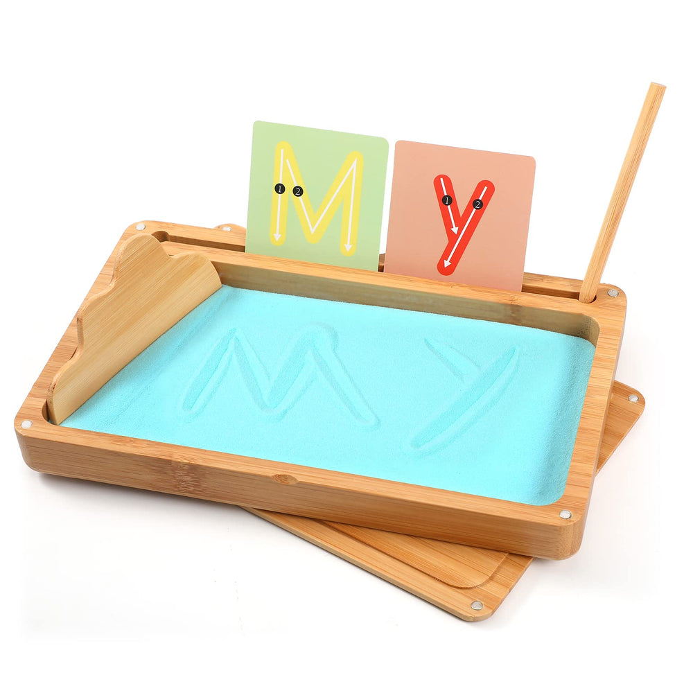 AtMini Montessori sand tray with blue lid for organized sensory play and handwriting practice.