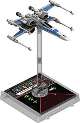 Two-player battle setup with Atomic Mass Games X-Wing core set for quick starts.