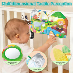Auby machine-washable cloth book stays clean after messy adventures.