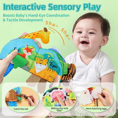 Auby cloth book features tactile tails for grasping and fine motor practice.