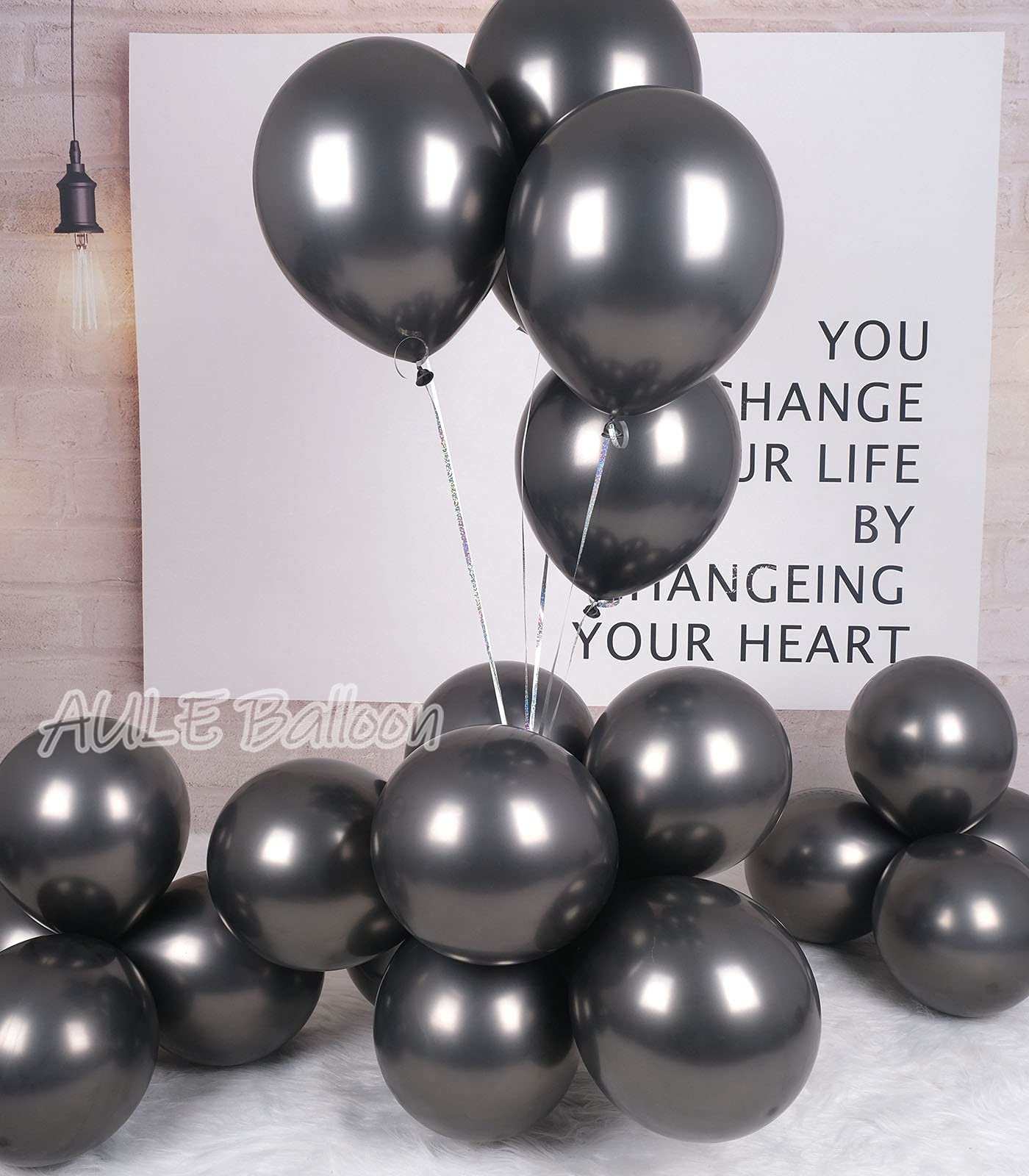 AULE black metallic balloons filled with helium for eye-catching party lift