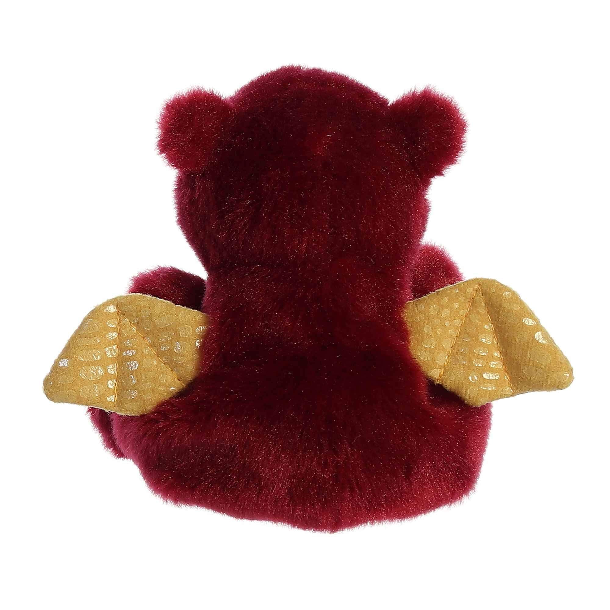 Aurora Aidan Dragon Palm Pal: soft plush with bean pellets for stable, safe play.