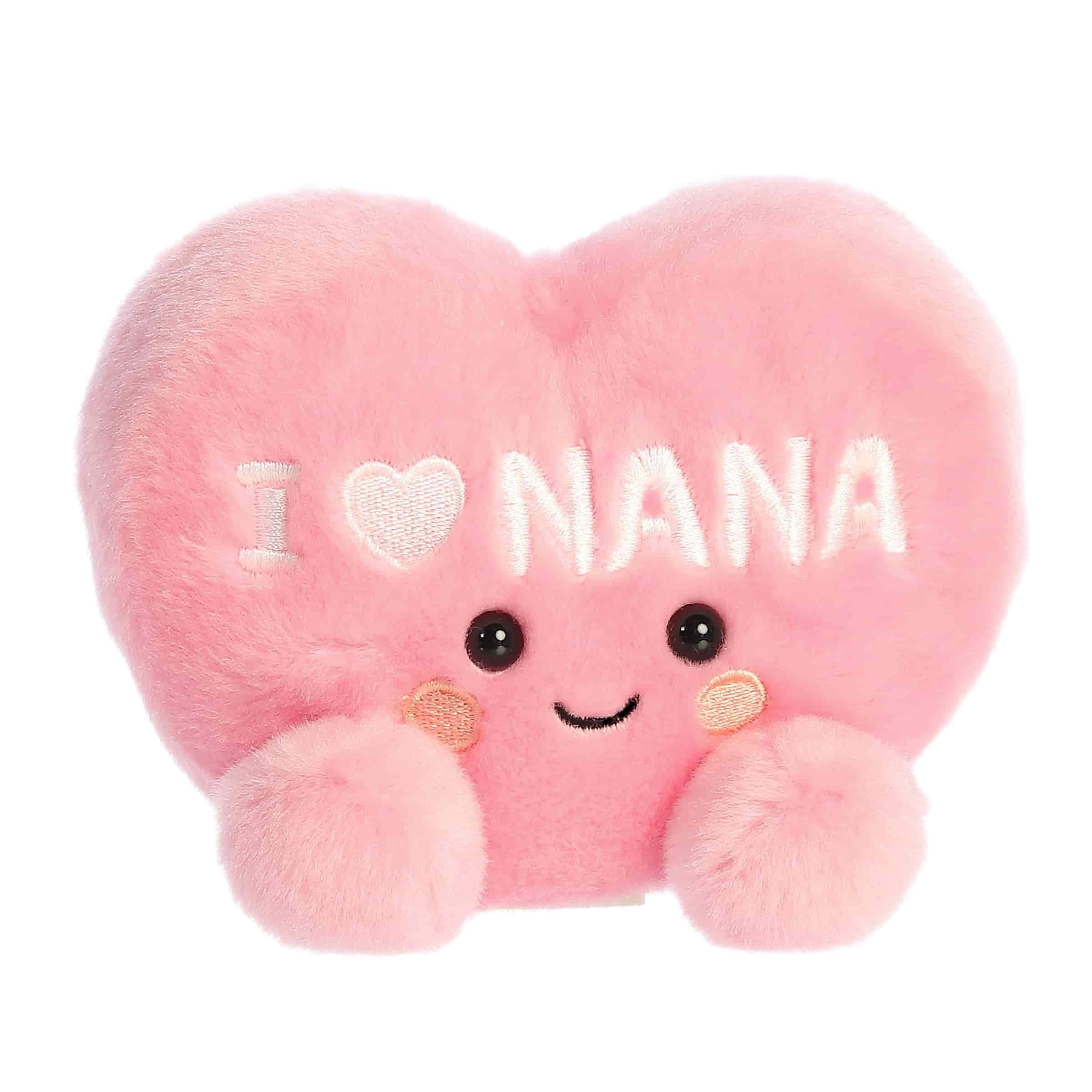 Aurora Palm Pals I Love Nana Heart stuffed animal close-up shows soft pink fur and cuddly texture.