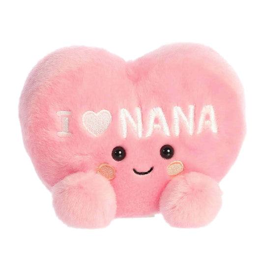 Aurora Palm Pals I Love Nana Heart stuffed animal close-up shows soft pink fur and cuddly texture.