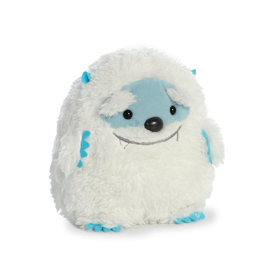 Aurora Baby Yeti 6in snuggle pose, ideal for holiday decor and gentle play.