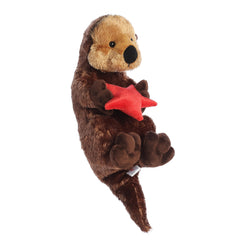 Aurora Cali Otter Flopsie hug-ready closeup inviting imaginative storytelling.