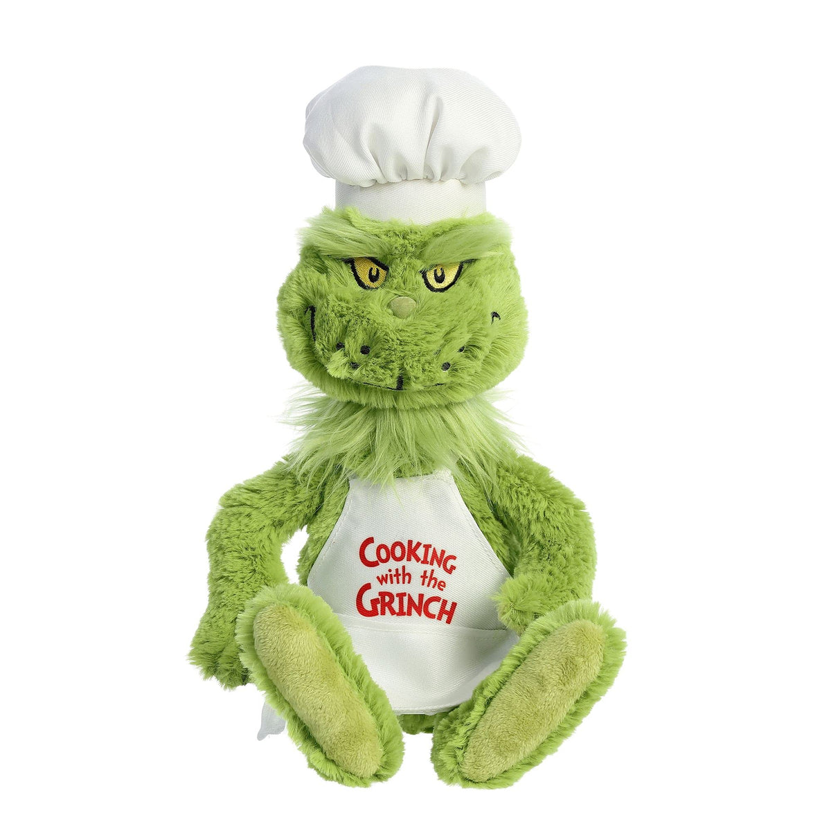Aurora Chef Grinch plush with hat and apron invites imaginative play.