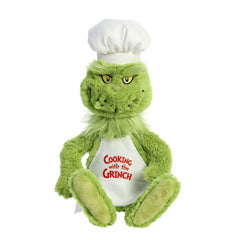 Aurora Chef Grinch plush with hat and apron invites imaginative play.