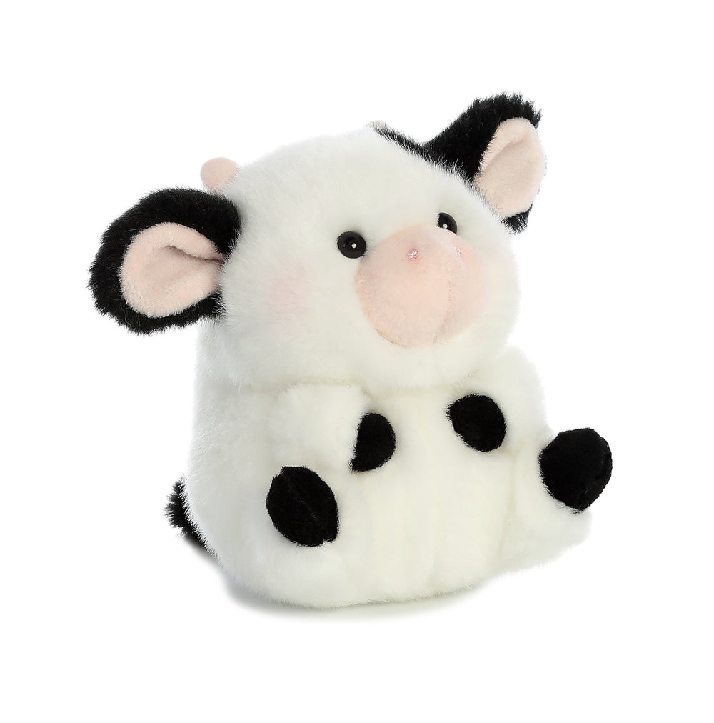 Aurora Daisy Cow plush face detail, compact comfort for on-the-go play