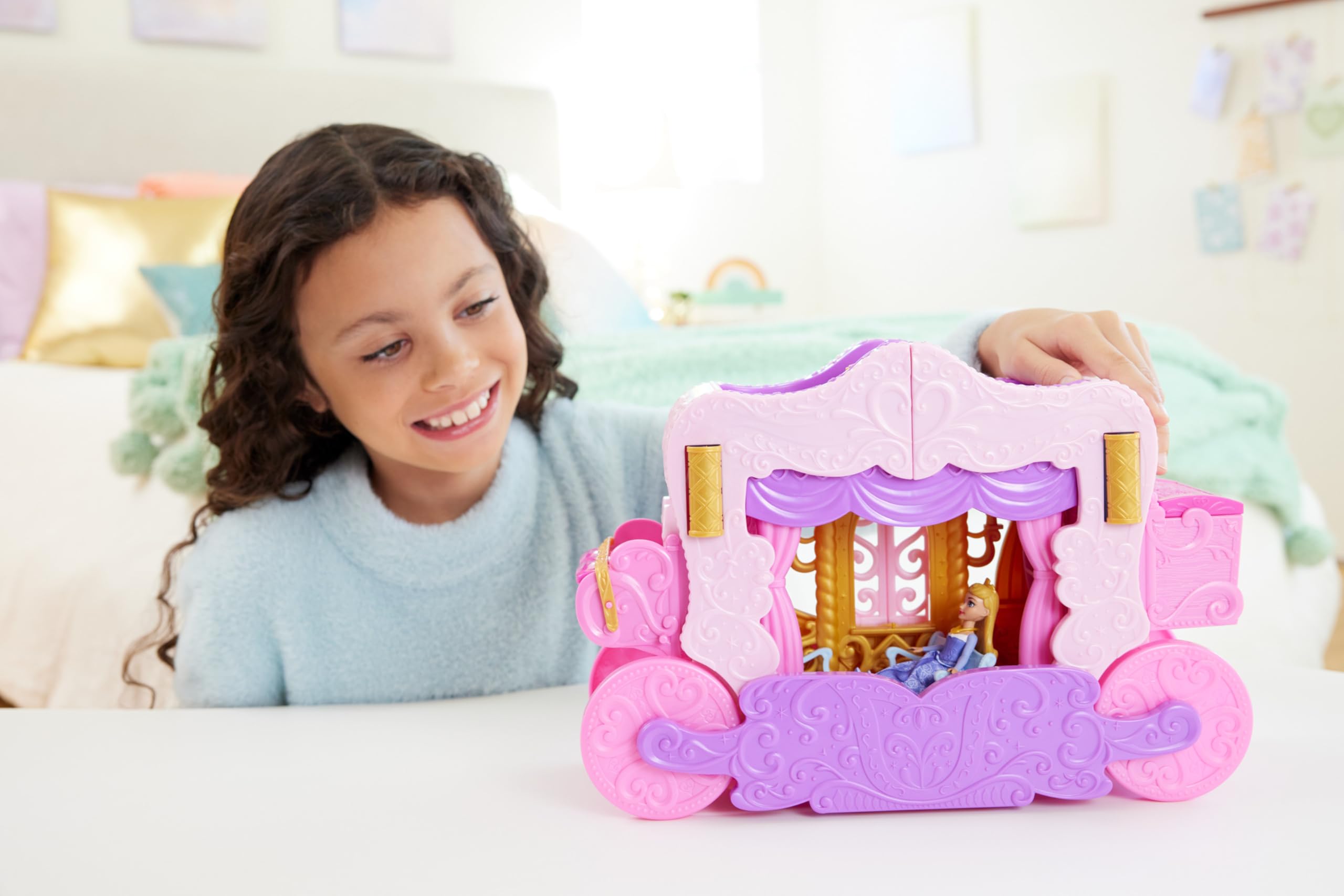 Disney Princess Aurora doll inside carriage ready for magical adventures with friends