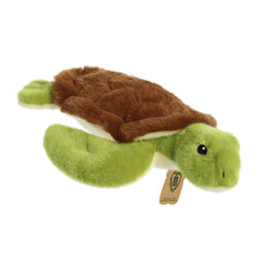 Vibrant green shell with brown pattern enhances playful, nature-inspired decor.