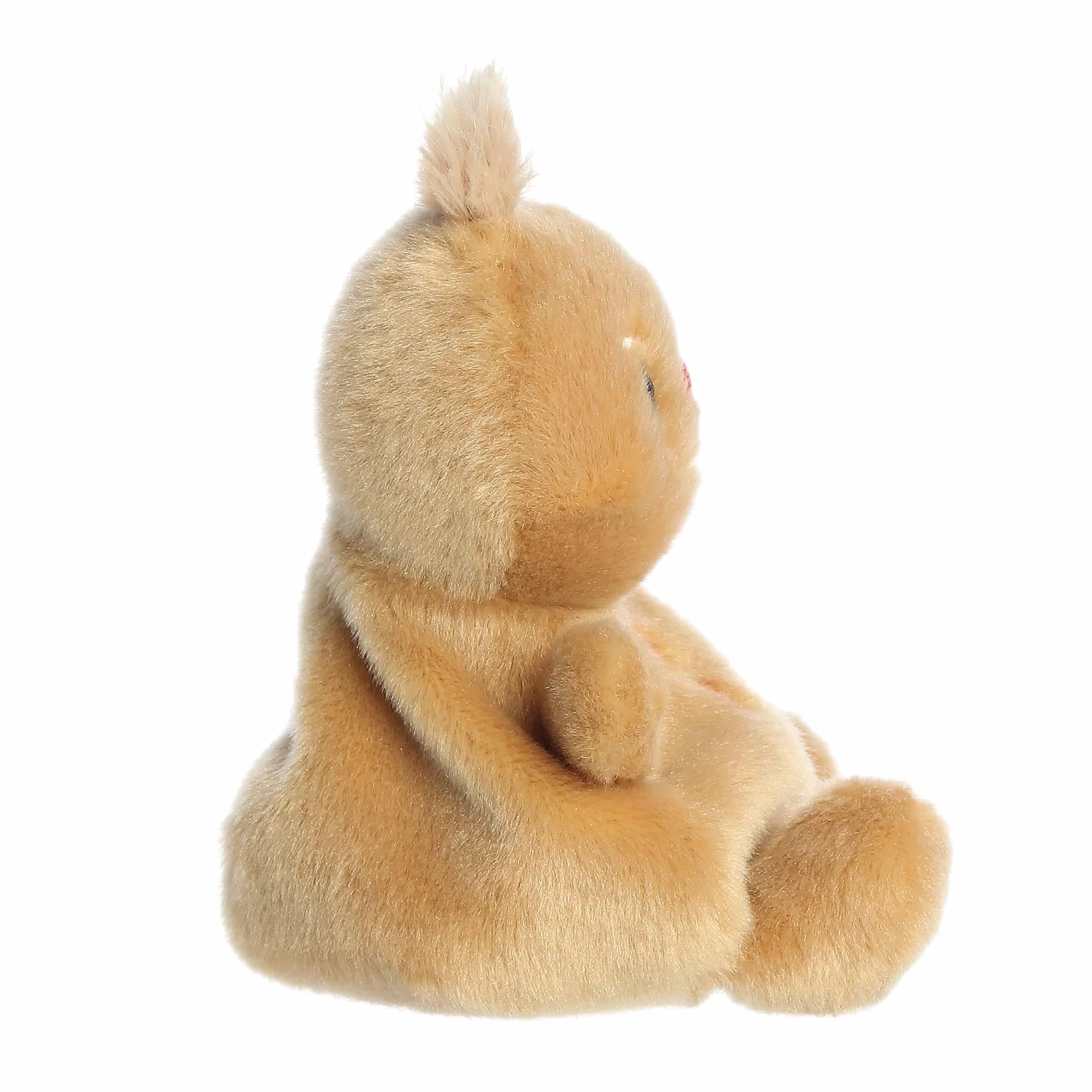 Aurora Gino Gingerbread Man plush fits in the hand for easy cuddling and display.