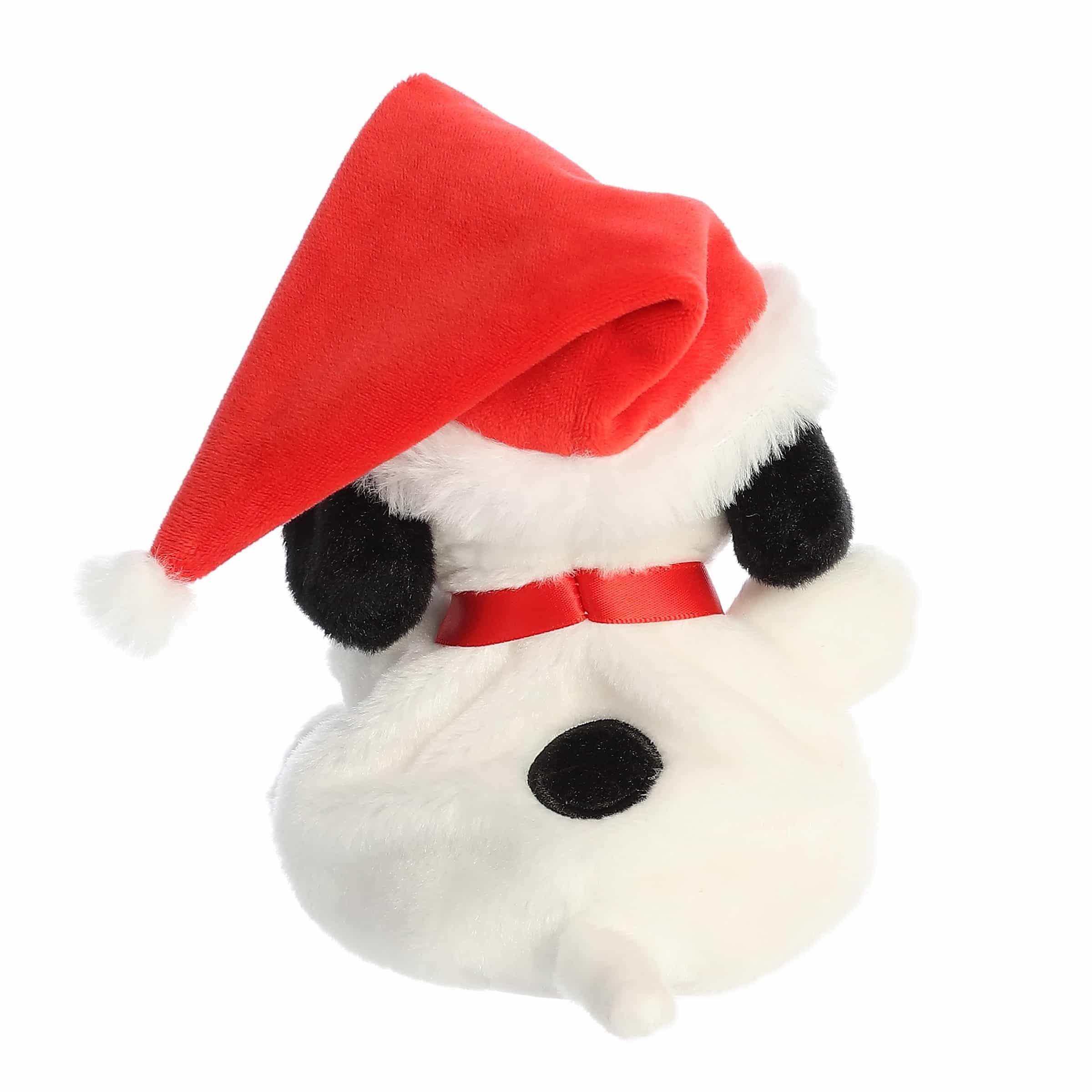 Packaging of Aurora Festive Peanuts Santa Snoopy Palm Pals shows official license for gift-ready keepsake.