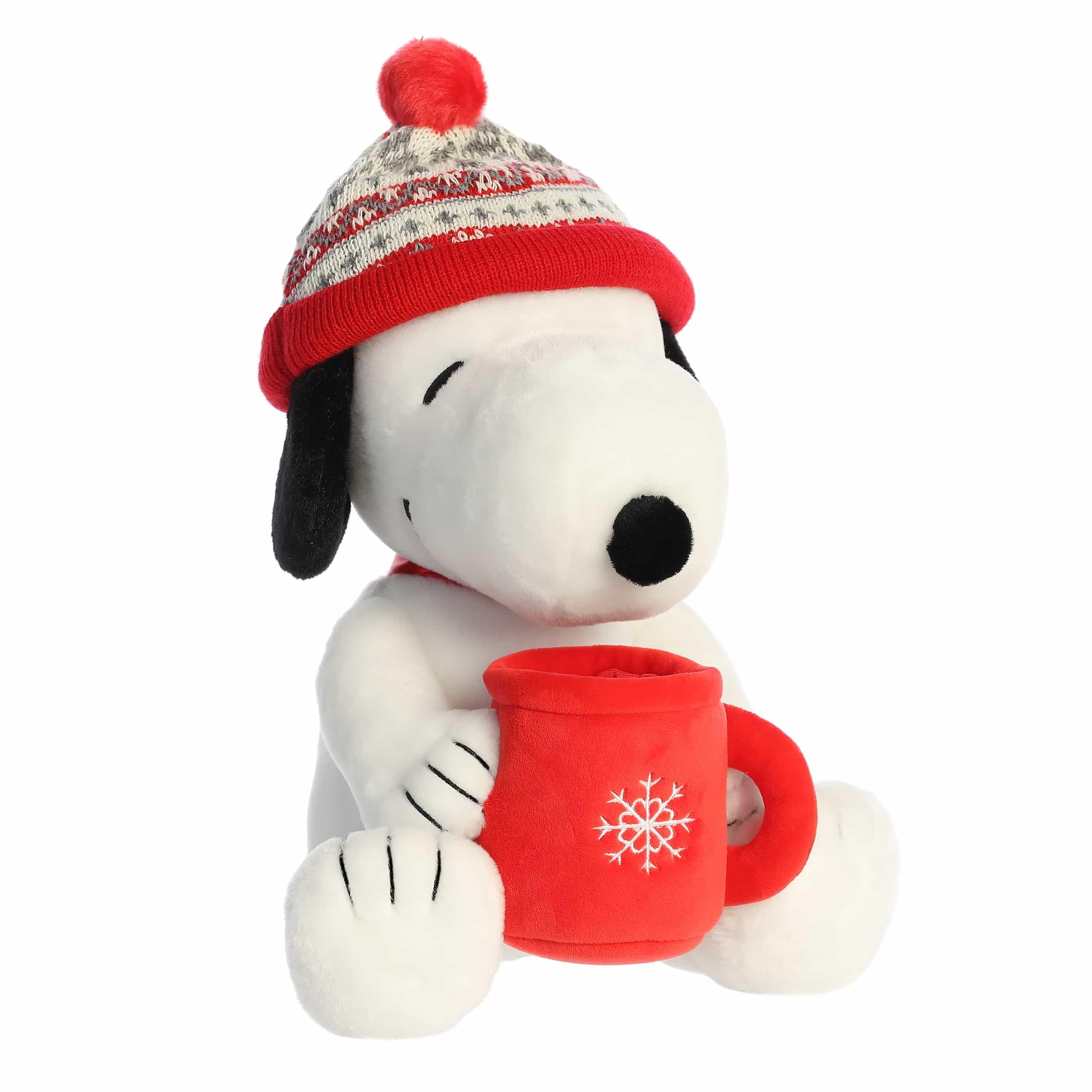 Aurora Festive Peanuts Snoopy winter hat stuffed animal with mug, perfect for cozy holiday display.