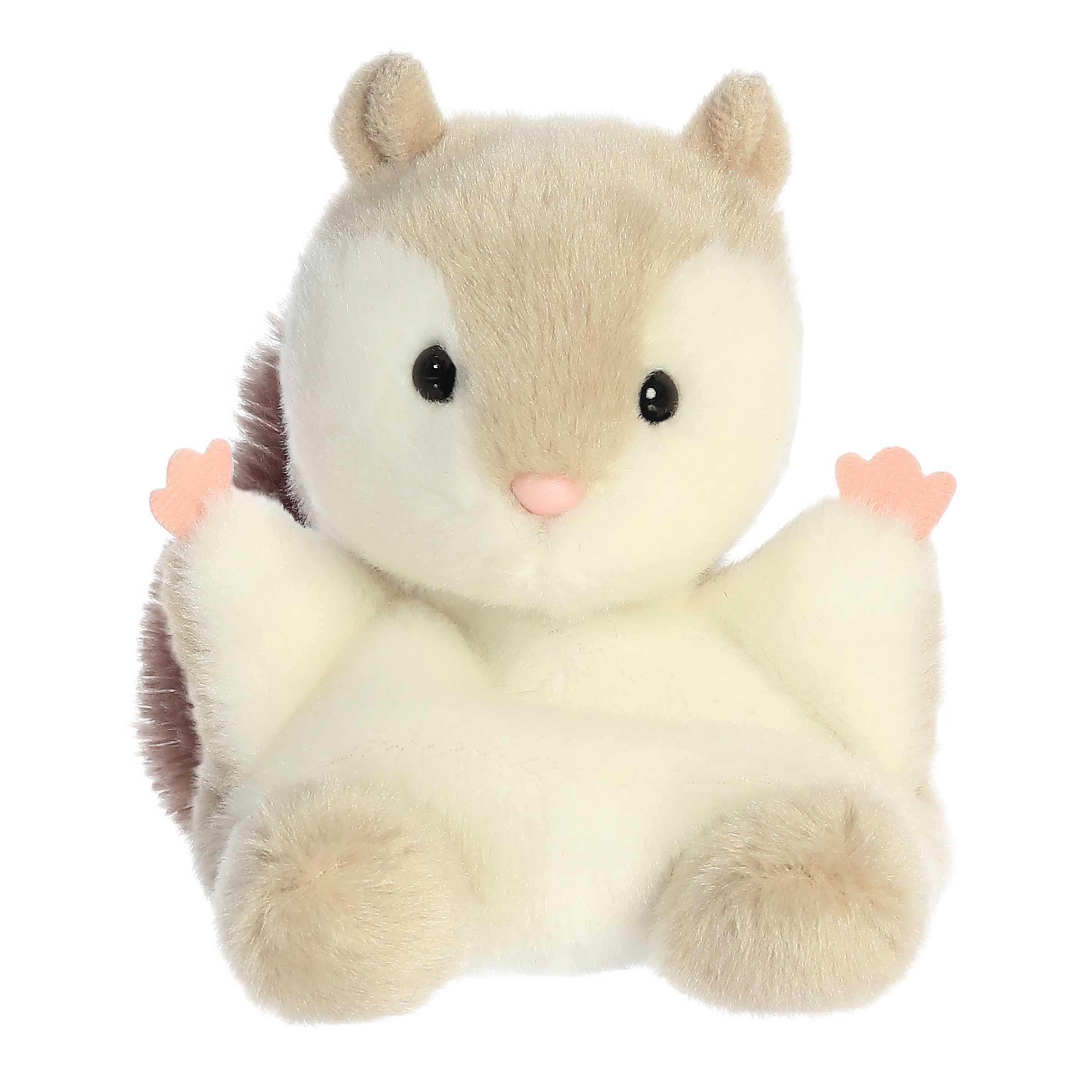 Aurora Flaps Flying Squirrel in hand showing compact size for travel hugs.