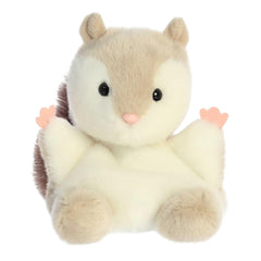 Aurora Flaps Flying Squirrel in hand showing compact size for travel hugs.
