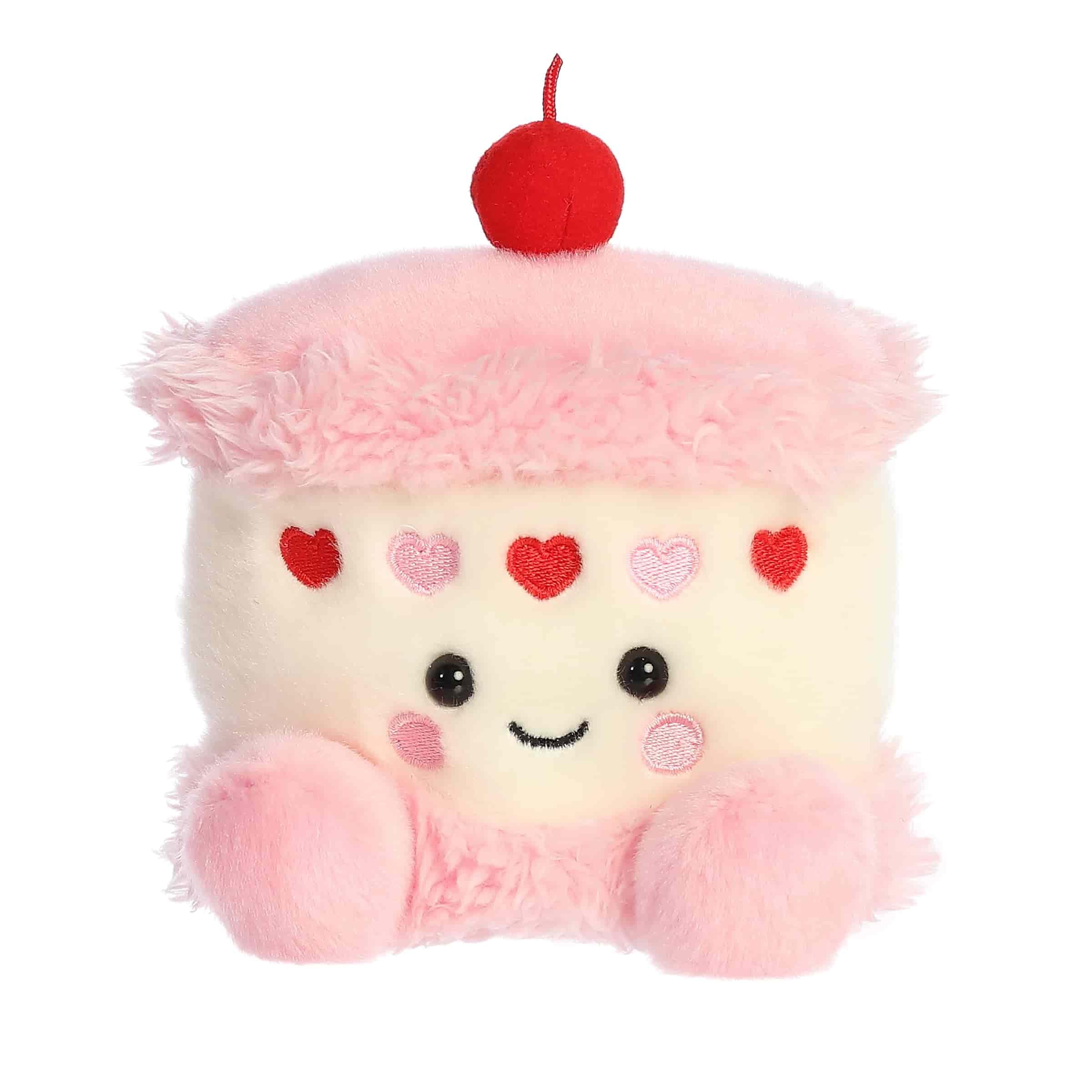 Aurora Jubi Heart Cake plush face close-up, soft pink and white layers for cozy play.