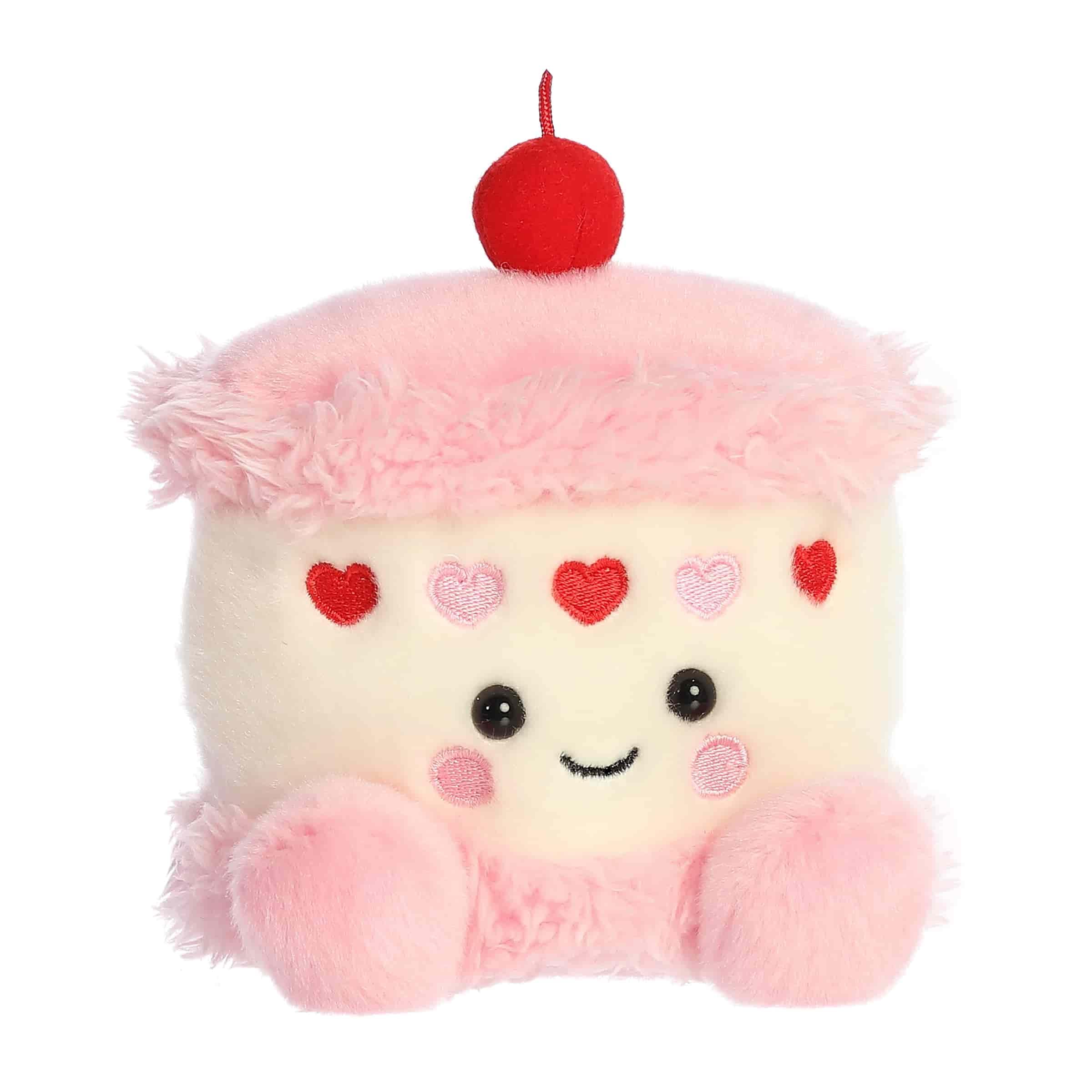 Aurora Jubi Heart Cake plush side view, compact palm-sized comfort for cuddling.