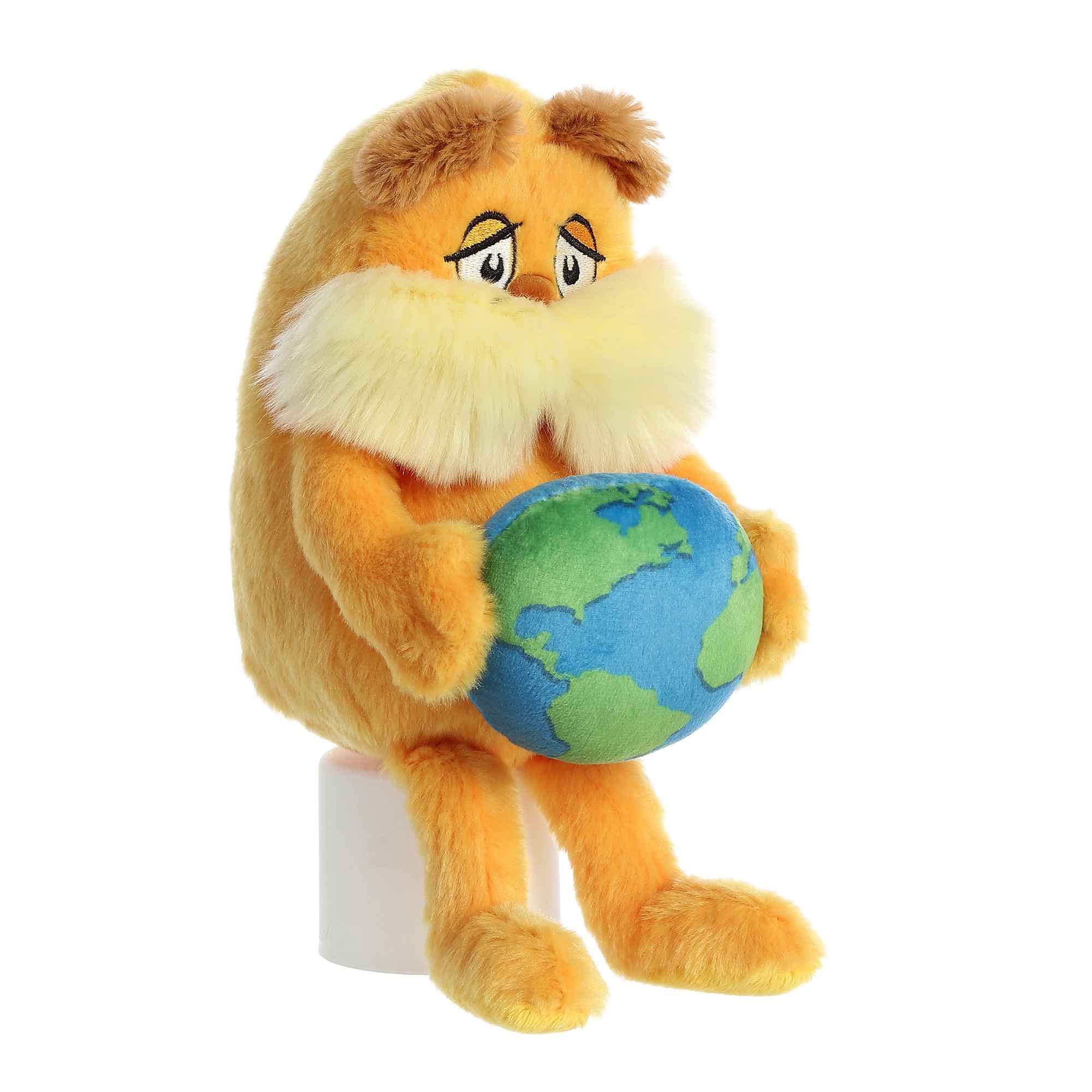 Aurora Lorax attached planet sewn to hands, providing stable display during play.