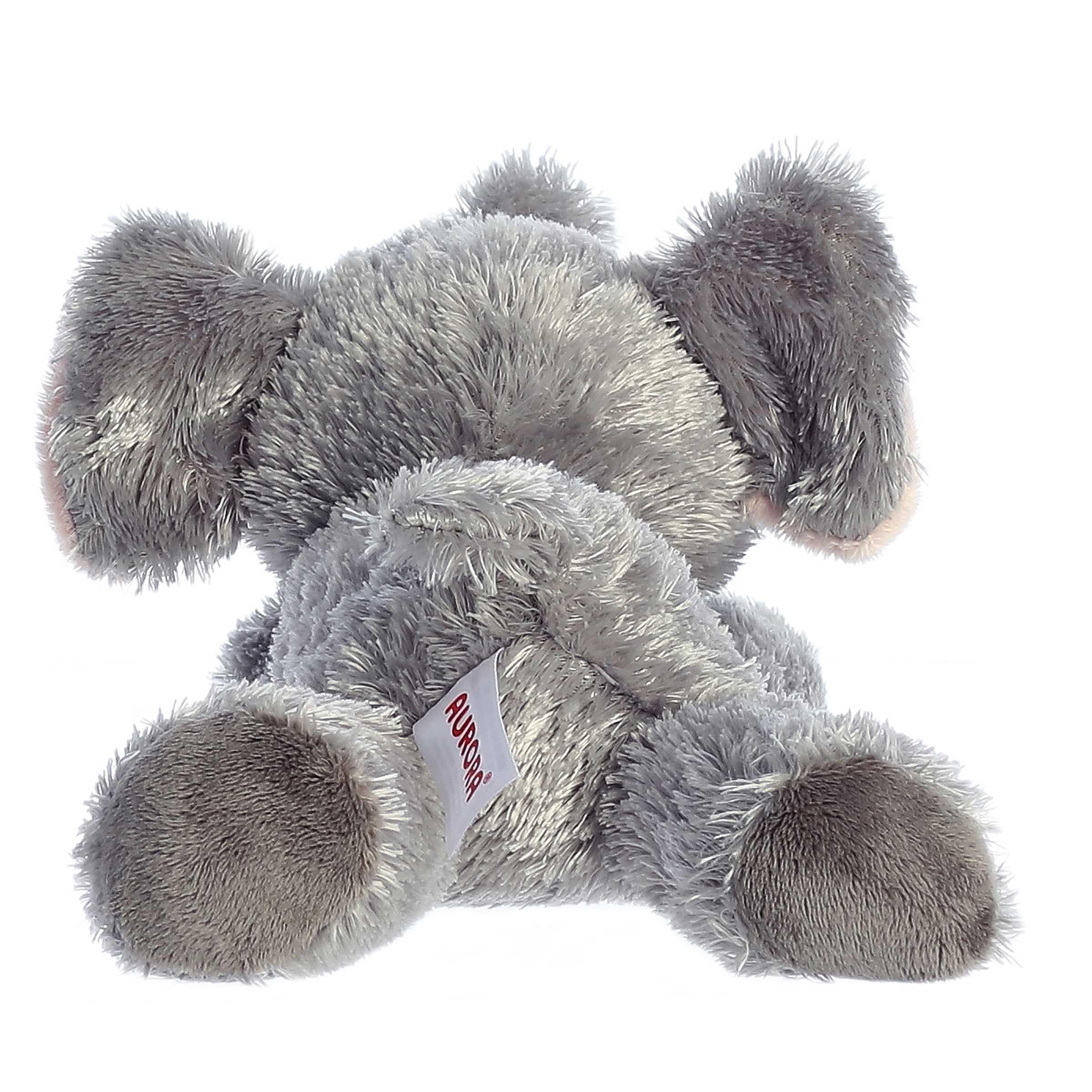 Aurora Ellie resting-on-belly plush pose, ideal for easy play sessions.