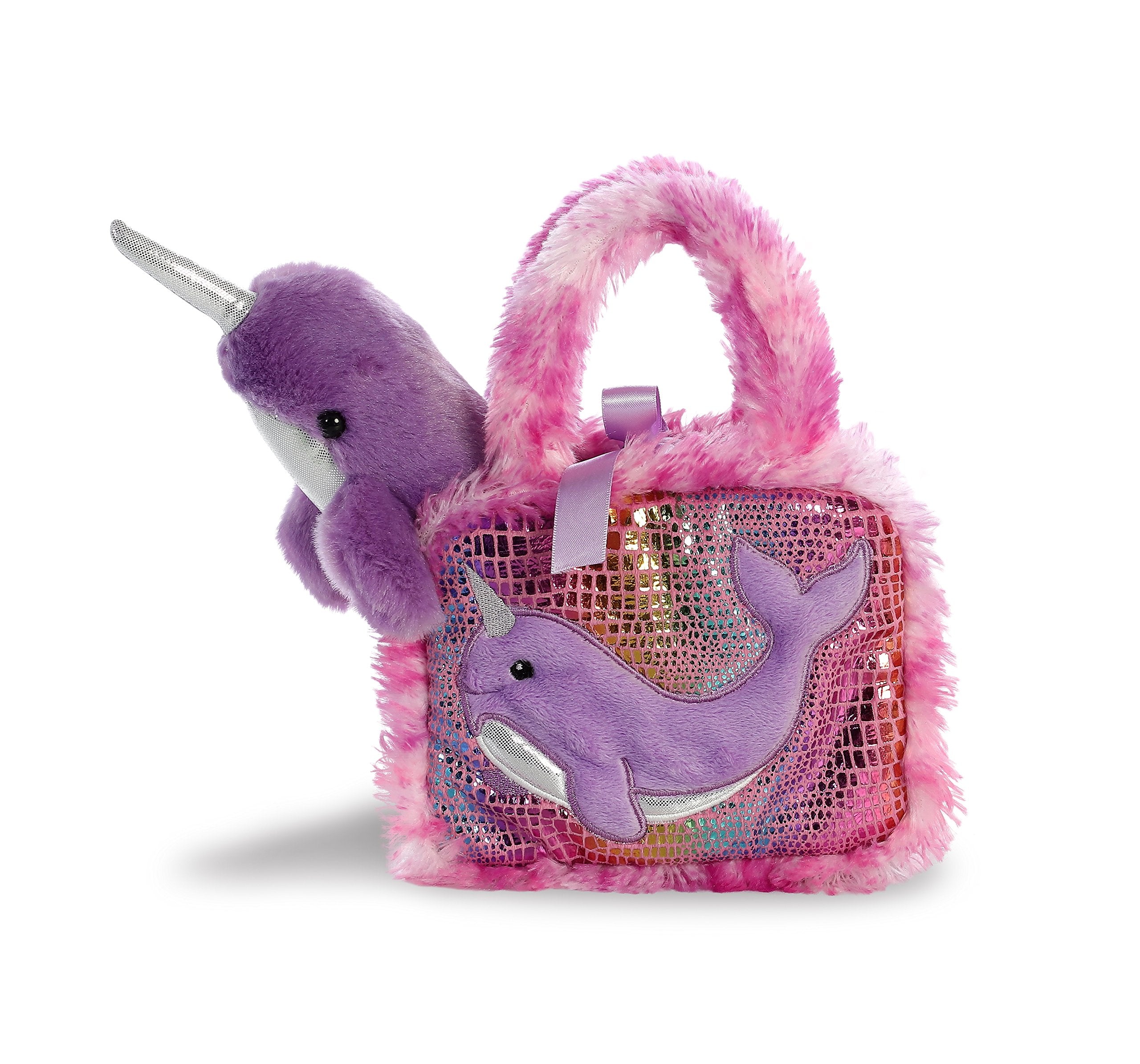 Removable Narwhal from its carrier by Aurora for portable storytelling adventures.