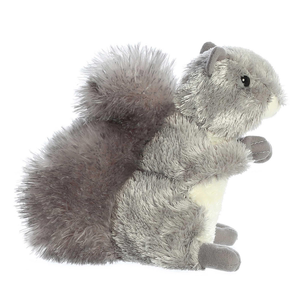 Aurora Nutty's fluffy tail adds charm during imaginative playtime.