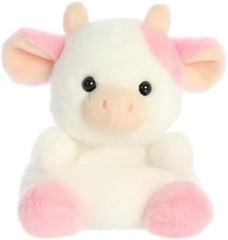Belle Strawberry Cow close-up with pink patches and soft plush.