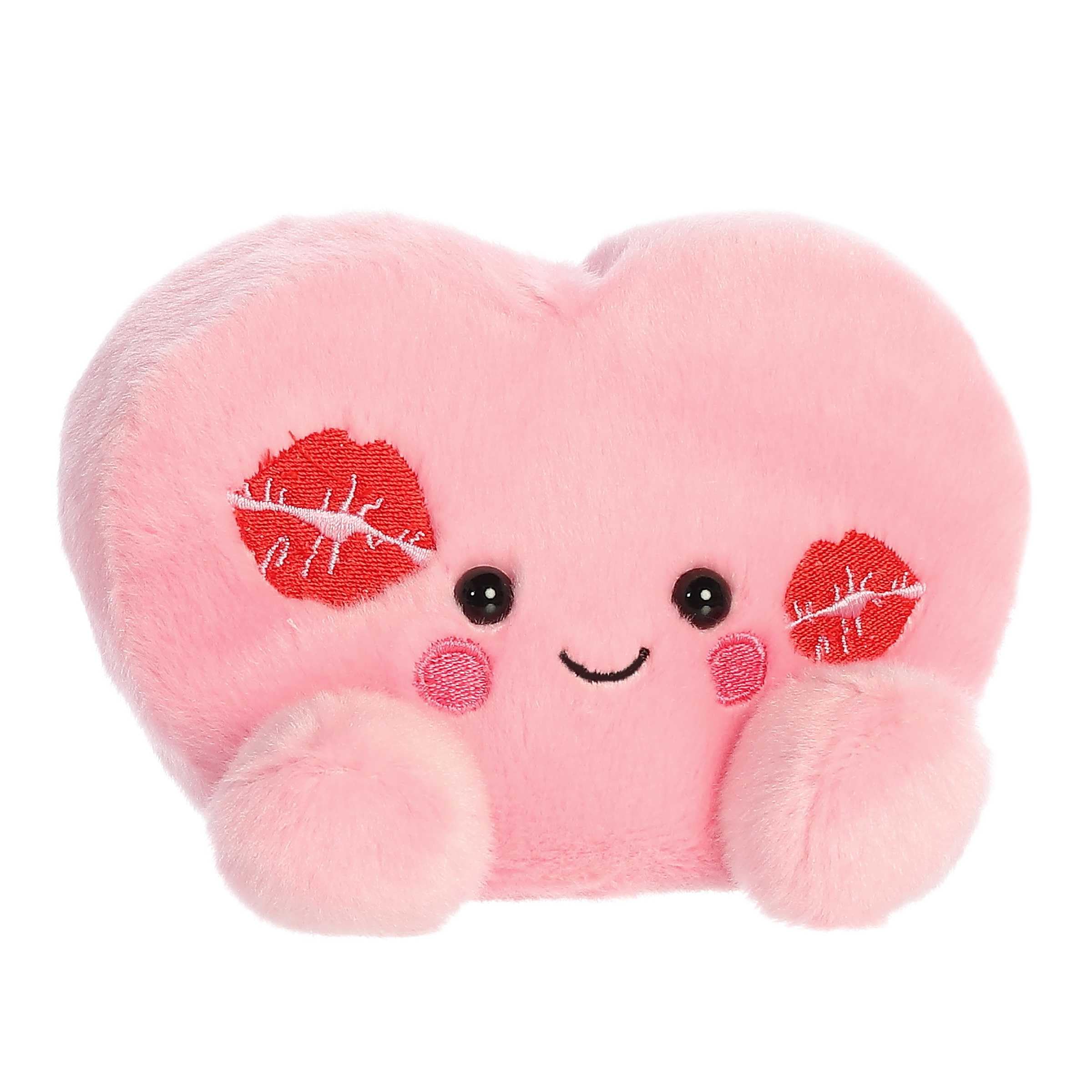 Aurora Palm Pals Kinsley Kisses Heart pocket-size plush for on-the-go cuddles.