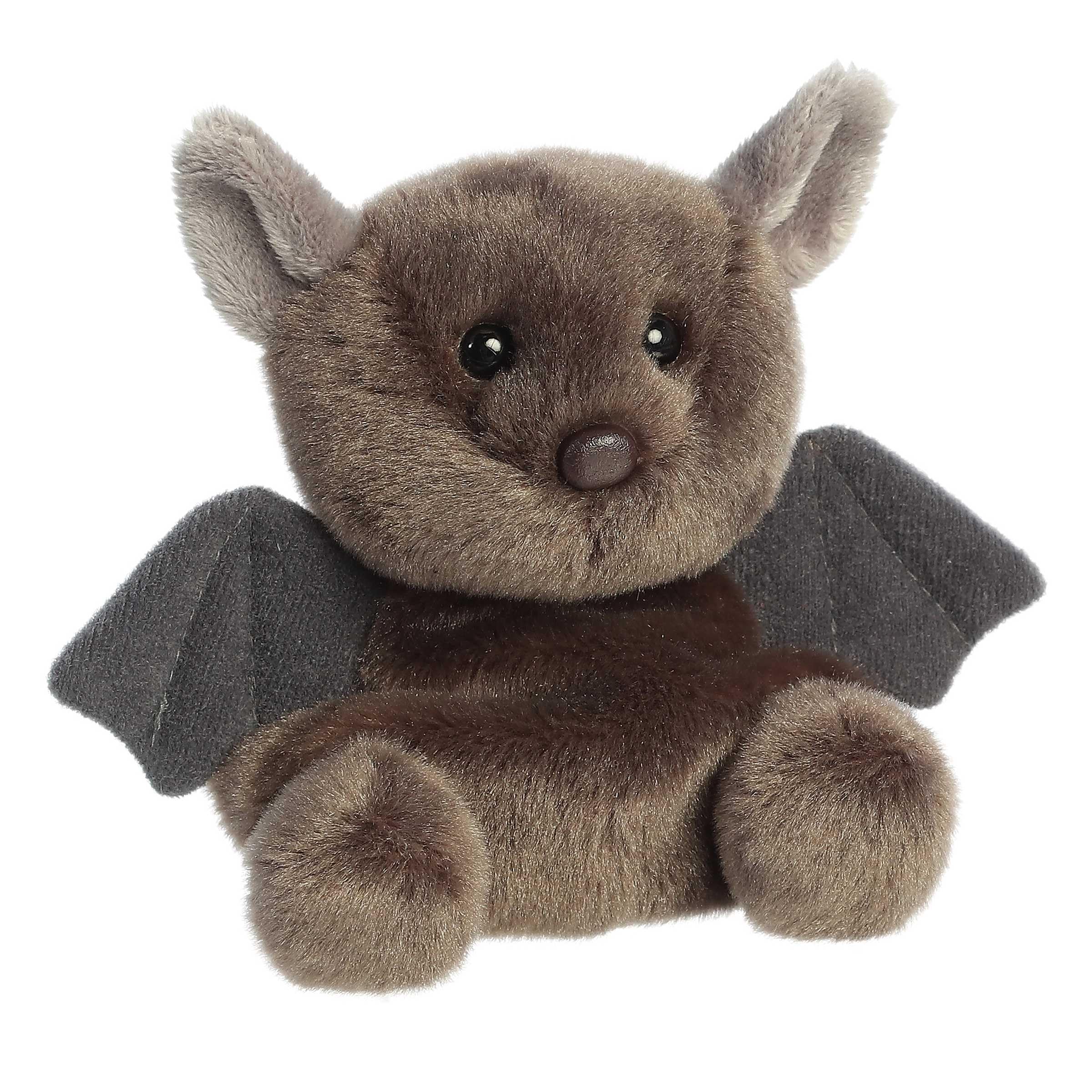 Aurora Luna Bat in hand shows palm-sized charm ideal for travel