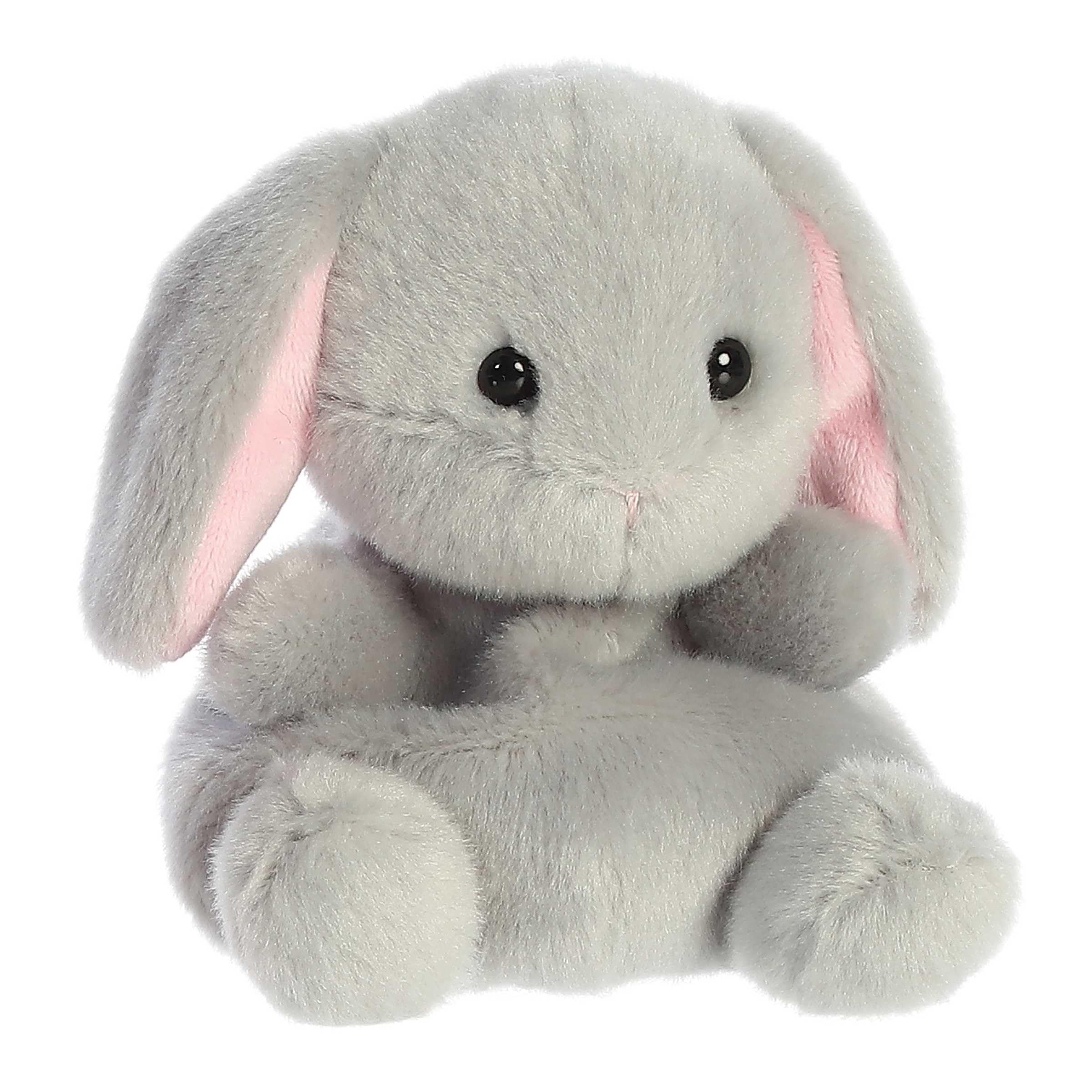 Aurora Palm Pals Pebbles Bunny in hand, ideal for on-the-go pretend play