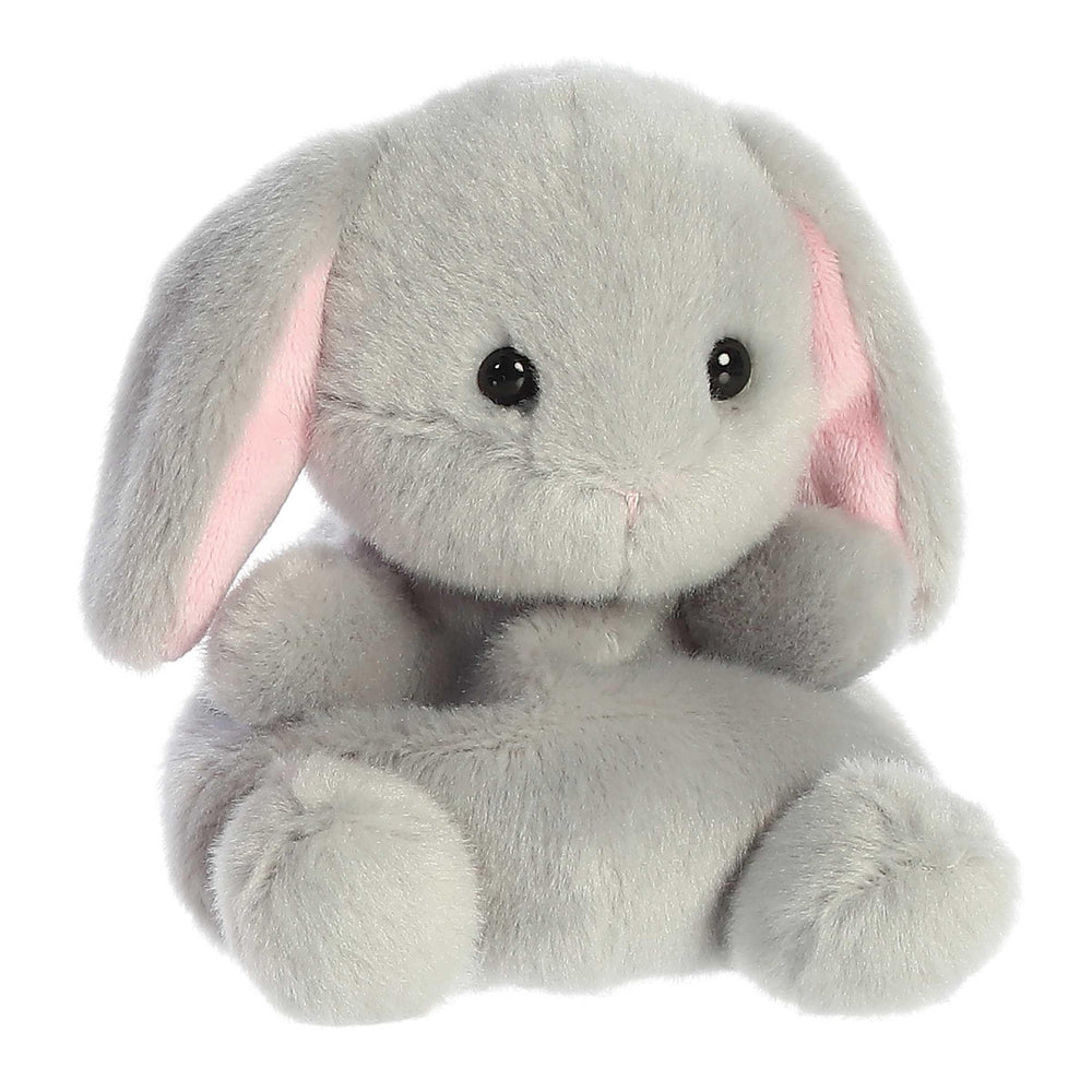 Aurora Palm Pals Pebbles Bunny in hand, ideal for on-the-go pretend play