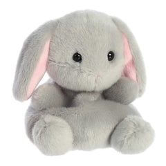 Aurora Palm Pals Pebbles Bunny in hand, ideal for on-the-go pretend play