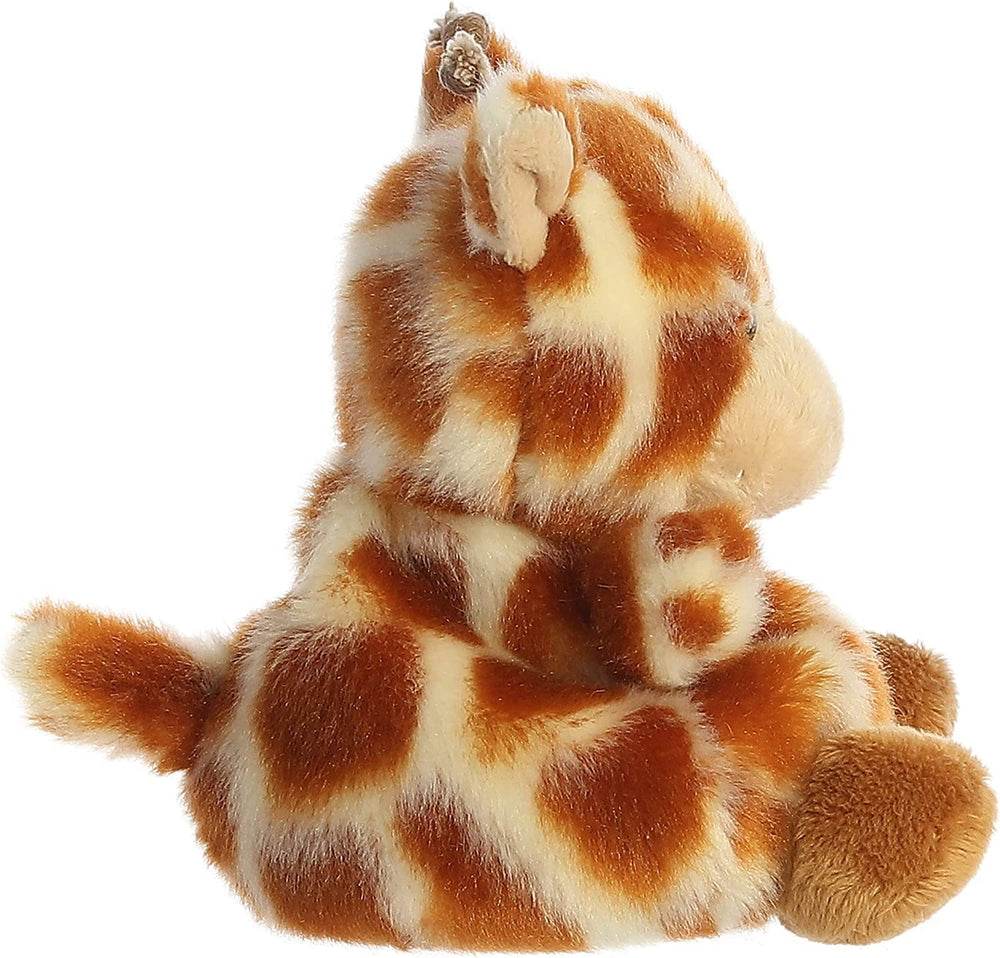 Aurora Palm Pals Safara Giraffe plush with antlers, ideal for dresser display.