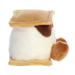 Aurora Palm Pals Toastee S'More plush in hand, portable happiness for travel.