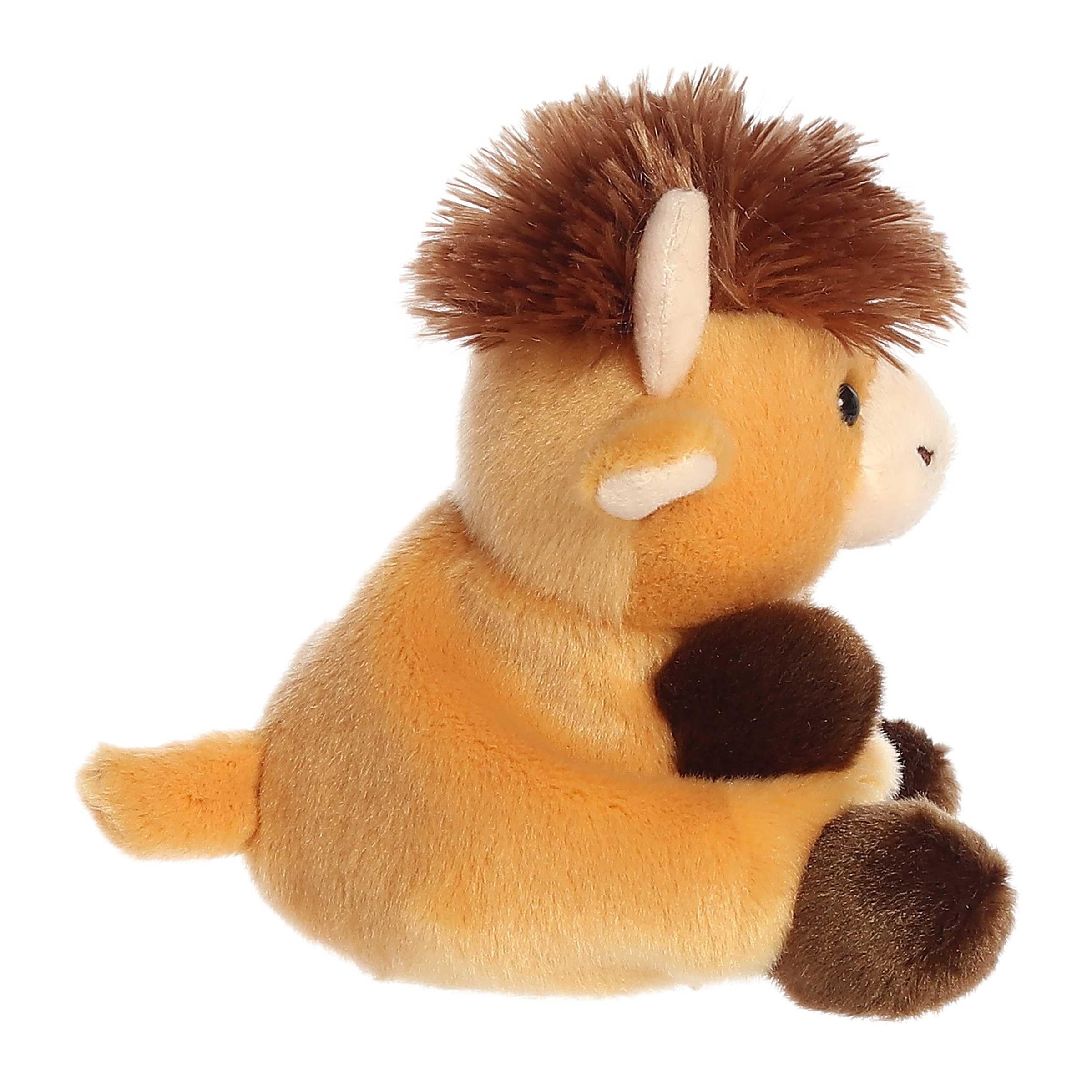Hubert Highland Cow fits in the palm, ideal for travel and pretend play