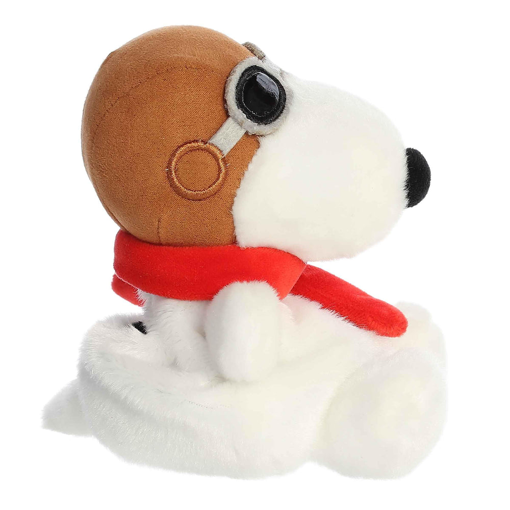 Aurora Palm Pals Flying Ace red scarf conveys dynamic motion.