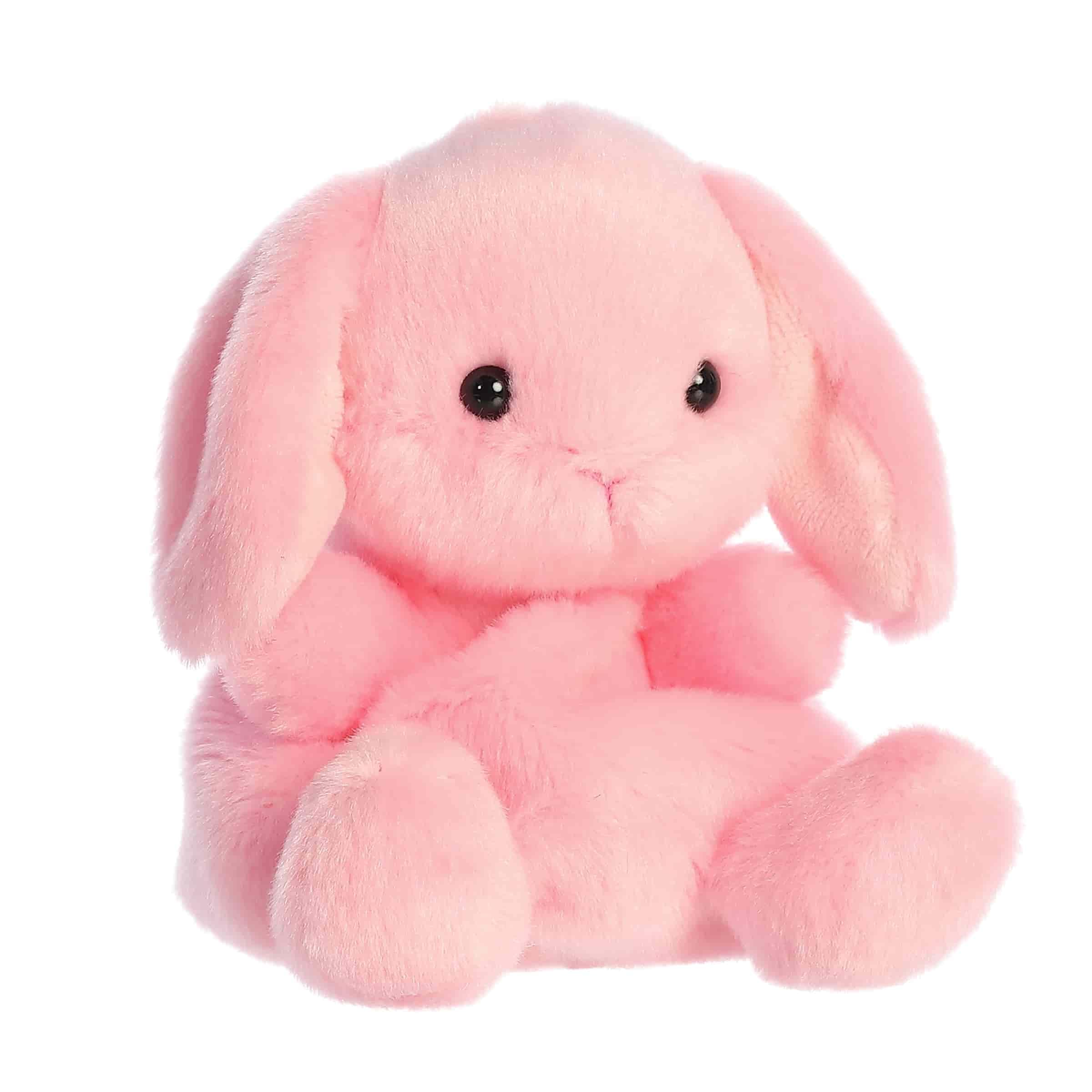 Aurora Adorable Palm Pals Petal Pink Lop Bunny stuffed animal resting pose highlights cuddle-worthy charm.
