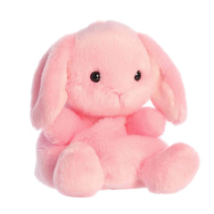 Aurora Adorable Palm Pals Petal Pink Lop Bunny stuffed animal resting pose highlights cuddle-worthy charm.