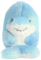 Aurora Sutton Shark plush shows paws on tummy with skyward feet for imaginative play.