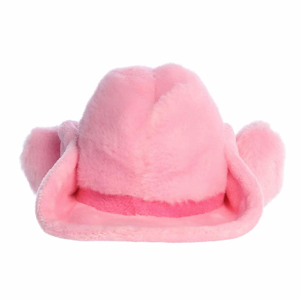 Aurora Sally Pink Cowgirl Hat on a shelf for room decor.