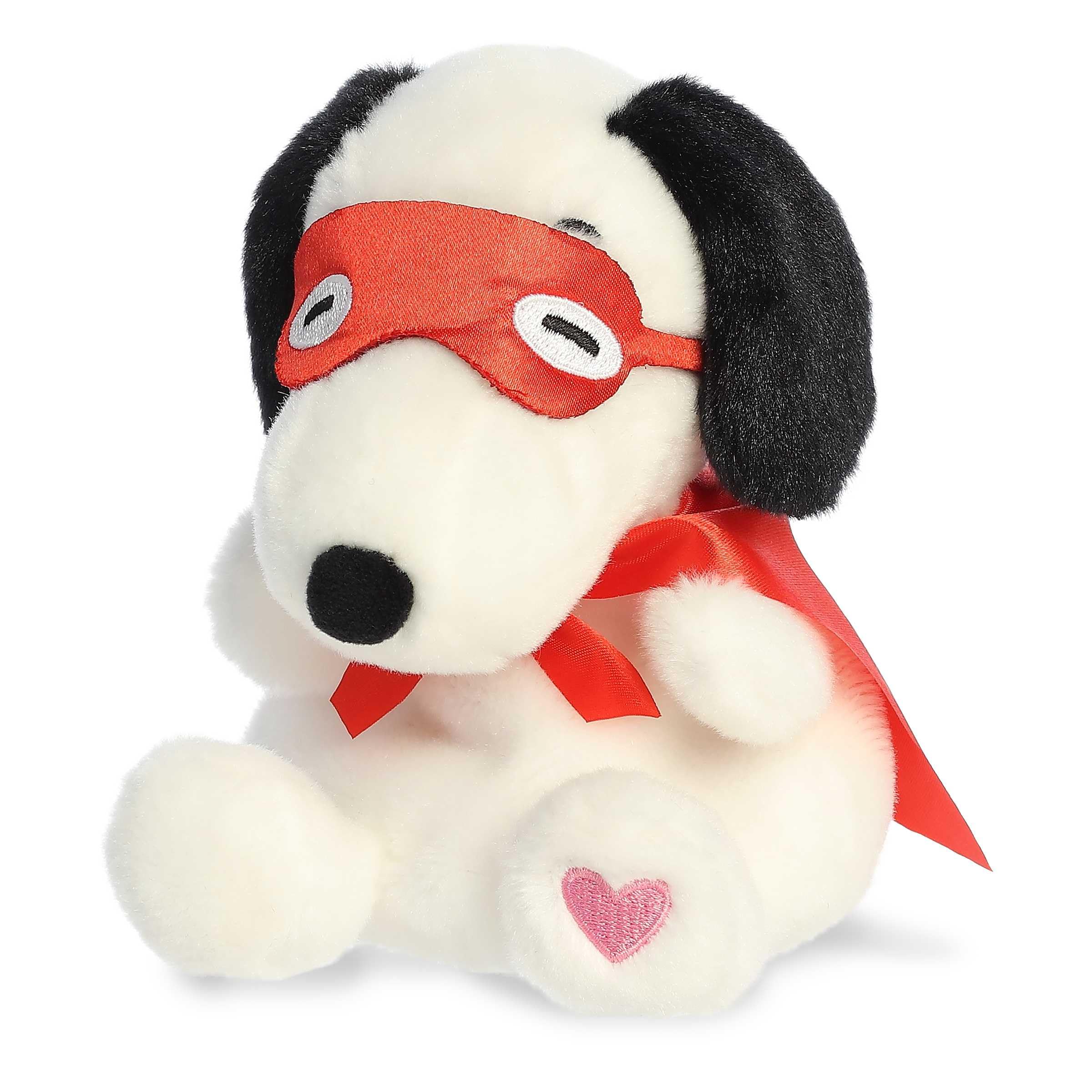 An Aurora Snoopy Kissing Bandit Palm Pal officially licensed Peanuts heritage.