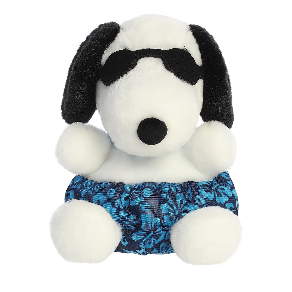 Aurora Snoopy palm pal plush wearing sunglasses, a soft travel-friendly companion.