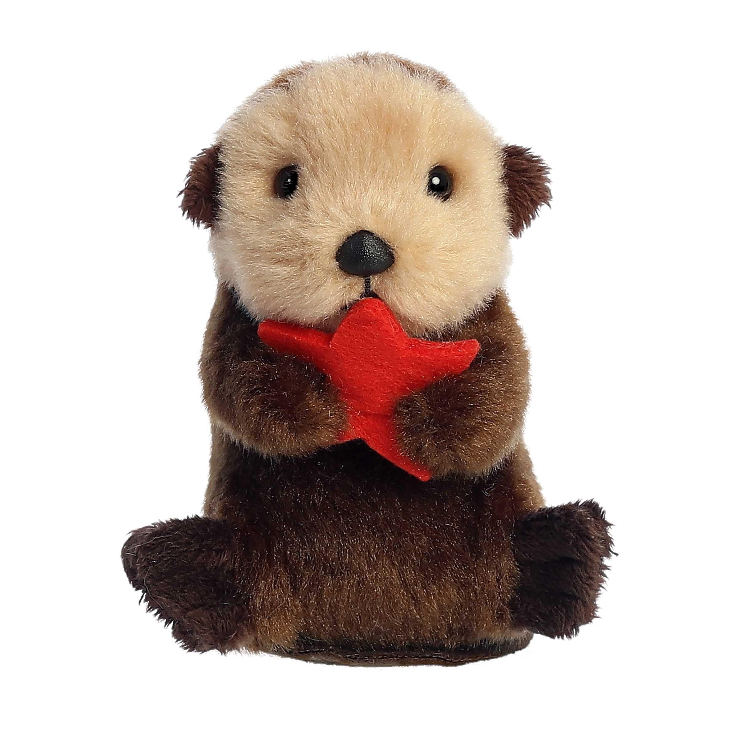 Aurora Spiffy Otter Shoulderkins on the shoulder for portable companionship.