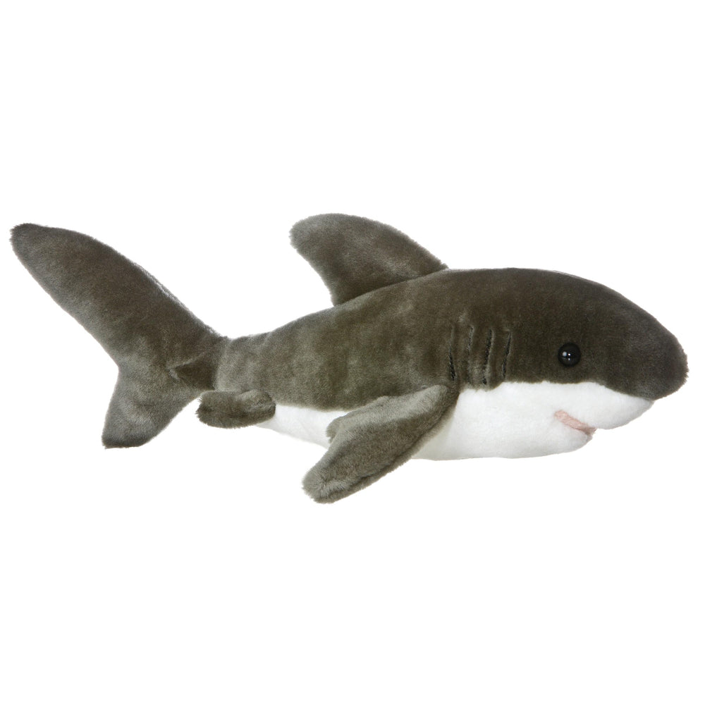 Aurora Tiburon Flopsie plush resting on belly, a cozy cuddle buddy for kids and adults.