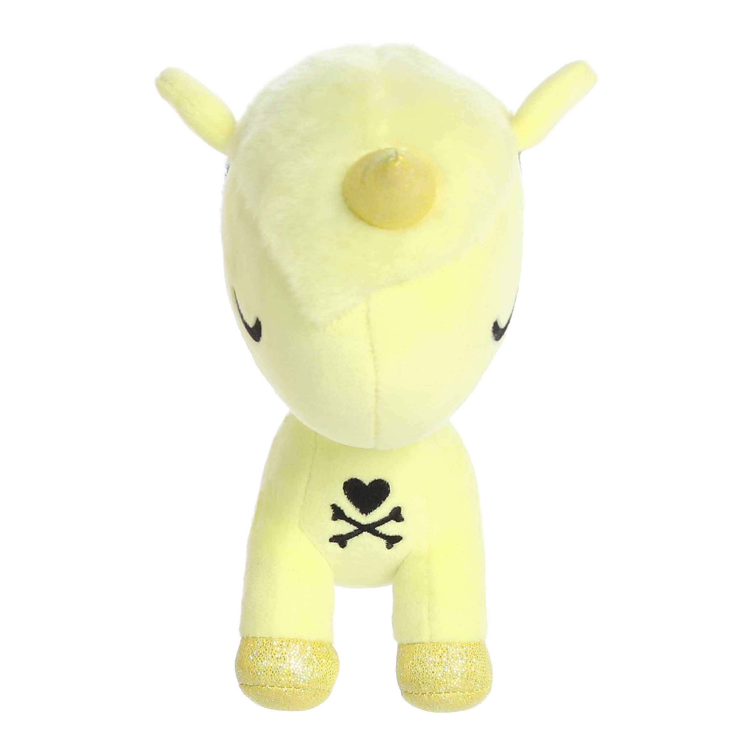 Aurora Tokidoki Mochi Sky Unicorno Little Star plush on a shelf, cheerful room decor.