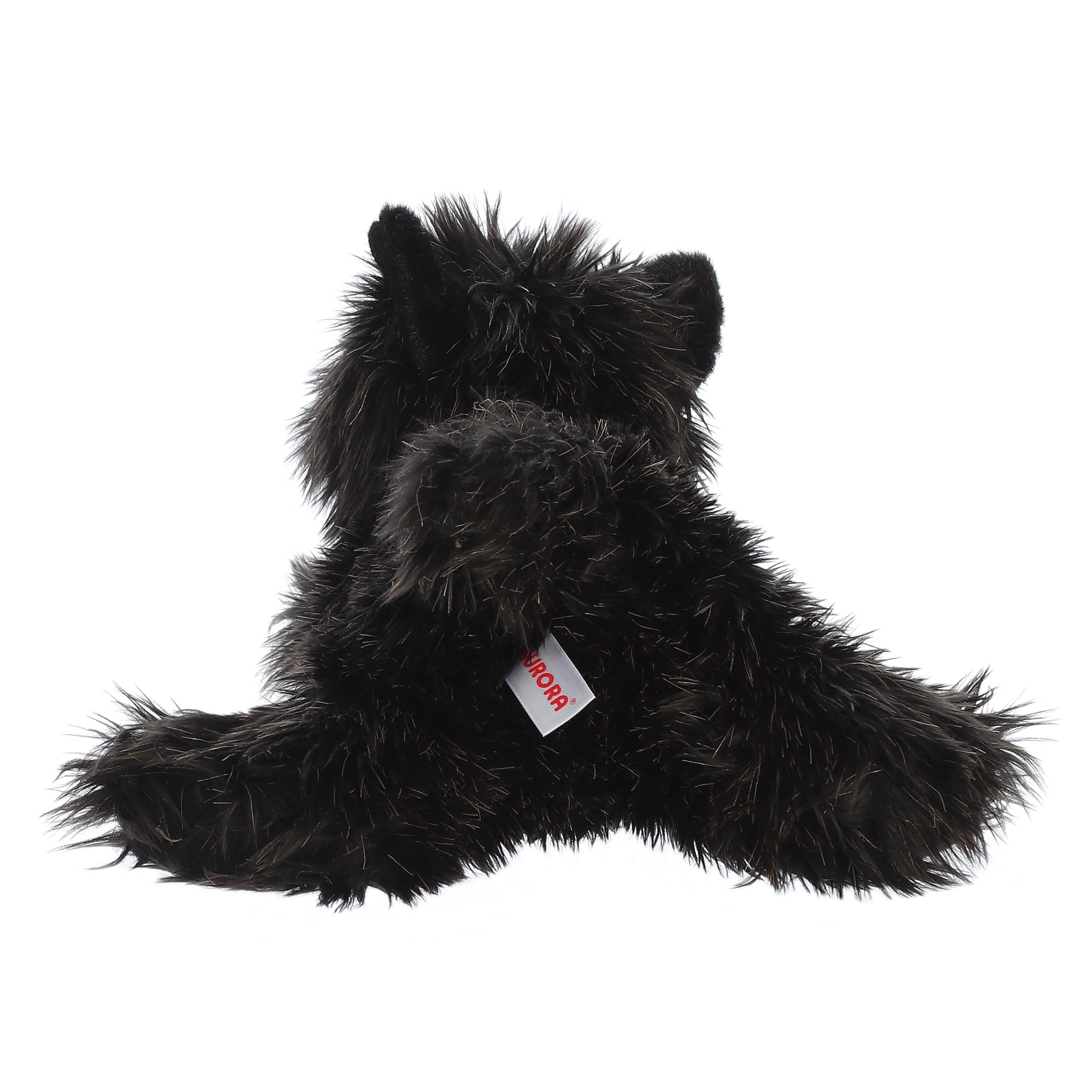 Kids playing with Toto Flopsie plush, inspiring gentle, imaginative adventures.